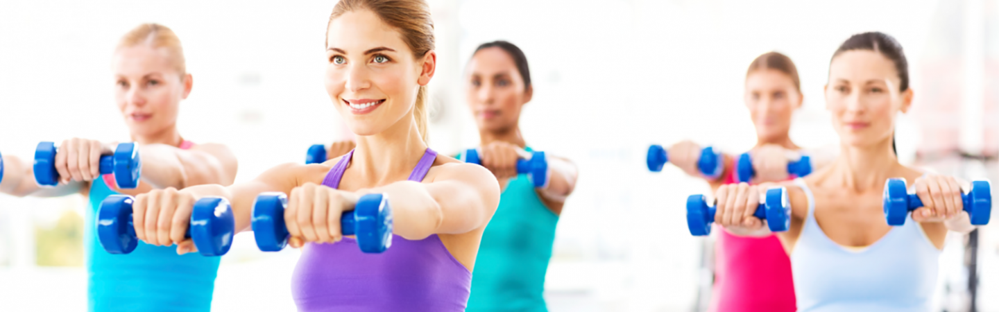 Women working out with hand weights